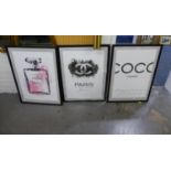 A SET OF THREE FRAMED 'CHANEL' POSTER PRINTS