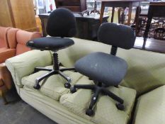 A REVOLVING OFFICE CHAIR AND ANOTHER (2)