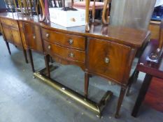 A REPRODUCTION MAHOGANY SERPENTINE FRONT SIDEBOARD (JAYCEE) (92cm high x 165cm long x 56cm deep)