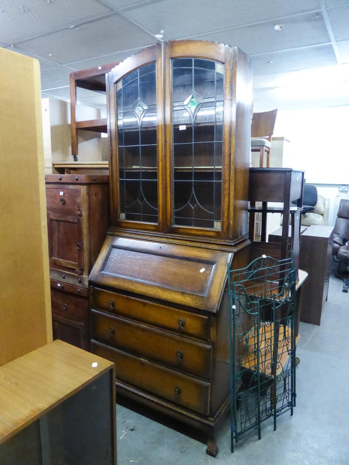 GOOD QUALITY OAK BUREAU BOOKCASE, THE TOP SECTION HAVING ARTS AND CRAFTS STYLE LEADED DOORS AND