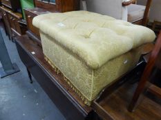 A BOX FORM OBLONG STOOL, BUTTON UPHOLSTERED IN GOLD SILK TAPESTRY, 2?2? X 1?8?