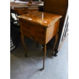 A WALNUTWOOD SEWING TABLE WITH DRAWER AND A WOODEN LUGGAGE STAND  (2)
