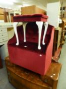 AN OTTOMAN BOX/SEAT, BUTTON UPHOLSTERED IN CRIMSON VELVET (75cm high x 74cm wide x 41cm deep) AND