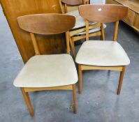 SET OF FOUR TEAK DINING CHAIRS HAVING SHAPED PANEL BACKS