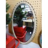 OVAL WALL MIRROR IN GILT FRAME