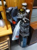 TWO GOLF BAGS, CONTAINING VARIOUS GOLF CLUBS, TO INCLUDE; KING COBRA TITANIUM WOOD, VARIOUS TITLEIST