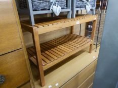 A SLATTED WOOD OBLONG BATHROOM STOOL