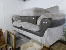A LARGE MODERN SETTEE WITH MATCHING LOUNGE CHAIR AND A MATCHING SQUARE BOX STOOL, COVERED IN GREY