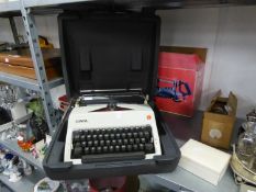 OLYMPIA TYPEWRITER, IN CASE AND A MITRE SAW (2)