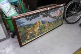 A LARGE PICTORIAL NEEDLEWORK TAPESTRY, LANDSCAPE WITH TIGERS, 18? X 44?, FRAMED AND GLAZED