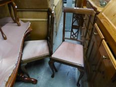 A PAIR OF MAHOGANY DINING ROOM SINGLE CHAIRS, WITH PIERCED SPLAT BACKS, DROP-IN SEATS, IN PINK