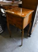 A WALNUTWOOD SEWING TABLE WITH DRAWER AND A WOODEN LUGGAGE STAND  (2)