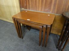 A NEST OF THREE TEAK OBLONG COFFEE TABLE, ON SQUARE TAPERING LEGS