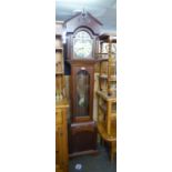 A MODERN MAHOGANY LONGCASE CLOCK WITH WEIGHT DRIVEN MOVEMENT, ARCH BRASS AND SILVERED DIAL, THE HOOD