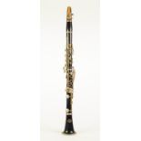 CORTON-CZECHOSLAVAKIA FOUR PART CLARINET, ebony and composition with gilt metal mounts and with