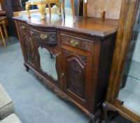 A LATE VICTORIAN CARVED WALNUWOOD SIDEBOARD, WITH RAISED MIRROR BACK (MIRROR BACK A.F.)