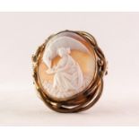 VICTORIAN LARGE OVAL SHELL CAMEO BROOCH depicting a classical female figure feeding a large bird, in
