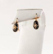 PAIR OF VICTORIAN GOLD MOURNING EARRINGS set with cabochon black onyx with gold star overlay, set