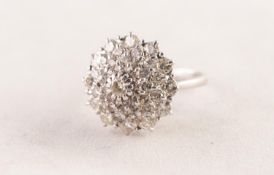 WHITE GOLD COLOURED METAL AND DIAMOND DOMED CIRCULAR CLUSTER RING set with a circular centre diamond