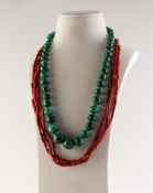 NECKLACE OF GRADUATED ROUND MALACHITE BEADS, 21in (53.3cm) long and a TRIPLE STRAND NECKLACE OF