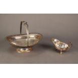 ELECTROPLATED SING HANDLED CAKE BASKET BY WALKER & HALL, of oval footed form with engraved floral