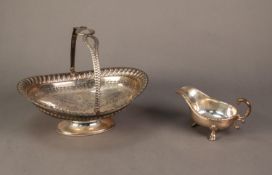 ELECTROPLATED SING HANDLED CAKE BASKET BY WALKER & HALL, of oval footed form with engraved floral