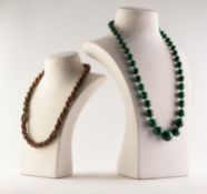NECKLACE OF GRADUATED ROUND MALACHITE BEADS, 22IN (55.8cm) long and a TWISTED TRIPLE STRAND NECKLACE
