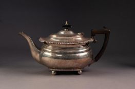 EDWARD VII REGENCY STYLE SILVER TEAPOT, of oval bellied form with black angular handle and knop,