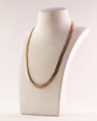 9ct THREE COLOUR GOLD CHOKER NECKLACE with entwined flat strands, trigger clasp, 16 in (40.6cm)
