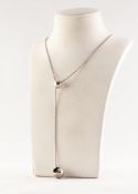 GEORG JENSEN CAVE PENDANT ON CHAIN, the silver chain necklace with bead front suspending a hollow