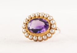 ATTRACTIVE VICTORIAN GOLD (unmarked) AMETHYST AND PEARL OVAL BROOCH with a centre large oval