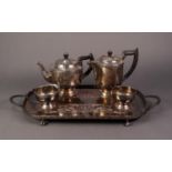 FOUR PIECE ?ALPHA PLATE? TEA SET, and a SILVER PLATED ON COPPER TWO HANDLED ROUNDED OBLONG GALLERIED