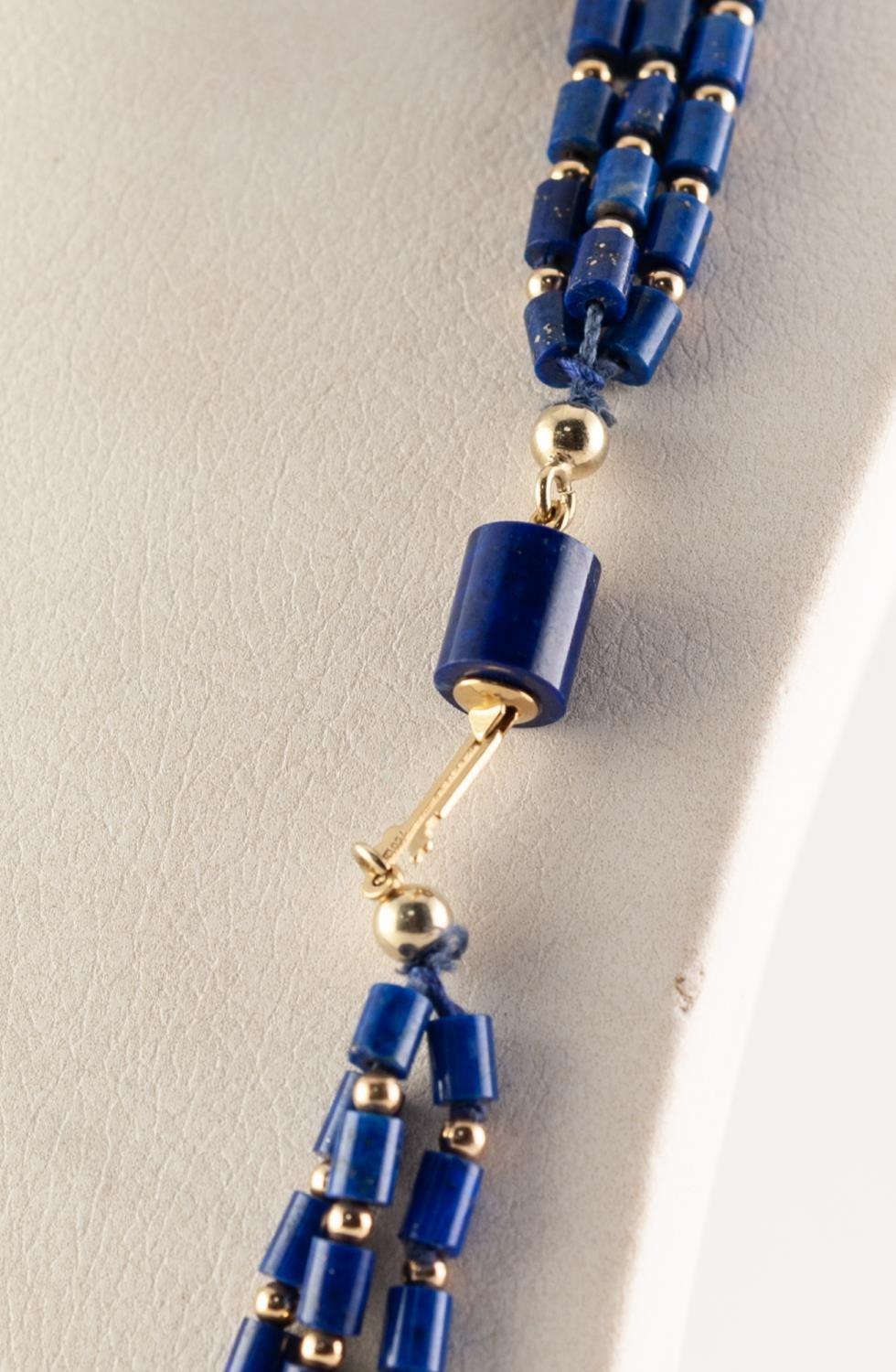 TRIPLE STRAND NECKLACE OF SMALL LAPIS LAZULI BUGLE BEADS with tiny gold coloured metal bead spacers, - Image 2 of 2