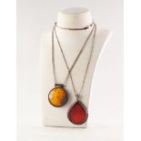 SILVER CHAIN NECKLACE and a SILVER AND GOLDEN AMBER DISC PENDANT, 1 1/4in (3.1cm) diameter and a