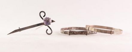 SCOTTISH SILVER CLAYMORE SHAPED BROOCH, claw set with a circular amethyst, 2 1/2in (6.3cm) long,
