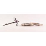 SCOTTISH SILVER CLAYMORE SHAPED BROOCH, claw set with a circular amethyst, 2 1/2in (6.3cm) long,