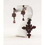 SILVER CROSS PENDANT set with garnet, 2in (5cm) high and a PAIR OF SILVER AND GARNET CLUSTER DROP