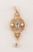 EDWARDIAN 15ct GOLD OPEN WORK SCROLL PENDANT set with a centre oval aquamarine and seed pearls and