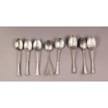 LATE VICTORIAN SET OF EIGHT SILVER TEASPOONS with twisted handles and volute scroll tops, Birmingham