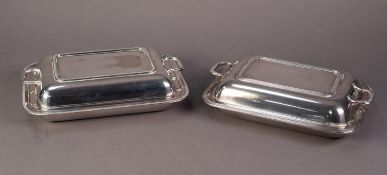 TWO ELECTROPLATE OBLONG ENTREE DISHES AND TWO HANDLED COVERS, one with oven proof glass liner (2)