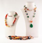 THREE HARDSTONE BEAD NECKLACES, one with a green hardstone tear shaped pendant