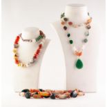 THREE HARDSTONE BEAD NECKLACES, one with a green hardstone tear shaped pendant