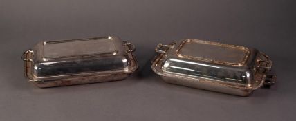 TWO ELECTROPLATED TWO HANDLED OBLONG ENTRÉE DISHES WITH COVERS, one plain, the other with Celtic