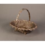 VICTORIAN ELECTROPLATED LARGE SWING HANDLED FRUIT BASKET, of oval, woven form with fruiting vine