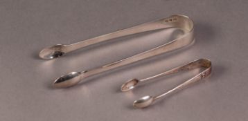 TWO SILVER SUGAR BOWS, comprising: one PLAIN, initialled, 5 ½? (14cm) long, London 1815, the other
