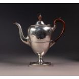 GEORGE V SILVER PEDESTAL COFFEE POT, of slender ovoid form with gadrooned borders, brown scroll