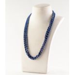 TRIPLE STRAND NECKLACE OF SMALL LAPIS LAZULI BUGLE BEADS with tiny gold coloured metal bead spacers,