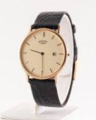 ROTARY GENT'S 9ct GOLD ULTRA SLIM WRISTWATCH, the circular cream dial with batons and date aperture,
