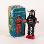 BOXED VINTAGE KO JAPAN TINPLATE CLOCKWORK 'PLANET ROBOT', black body with bright metal detail,