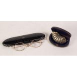 PAIR OF VICTORIAN GILT METAL FRAMED SPECTACLES, with oval lenses in a  CONTEMPORARY BLACK PAPIER